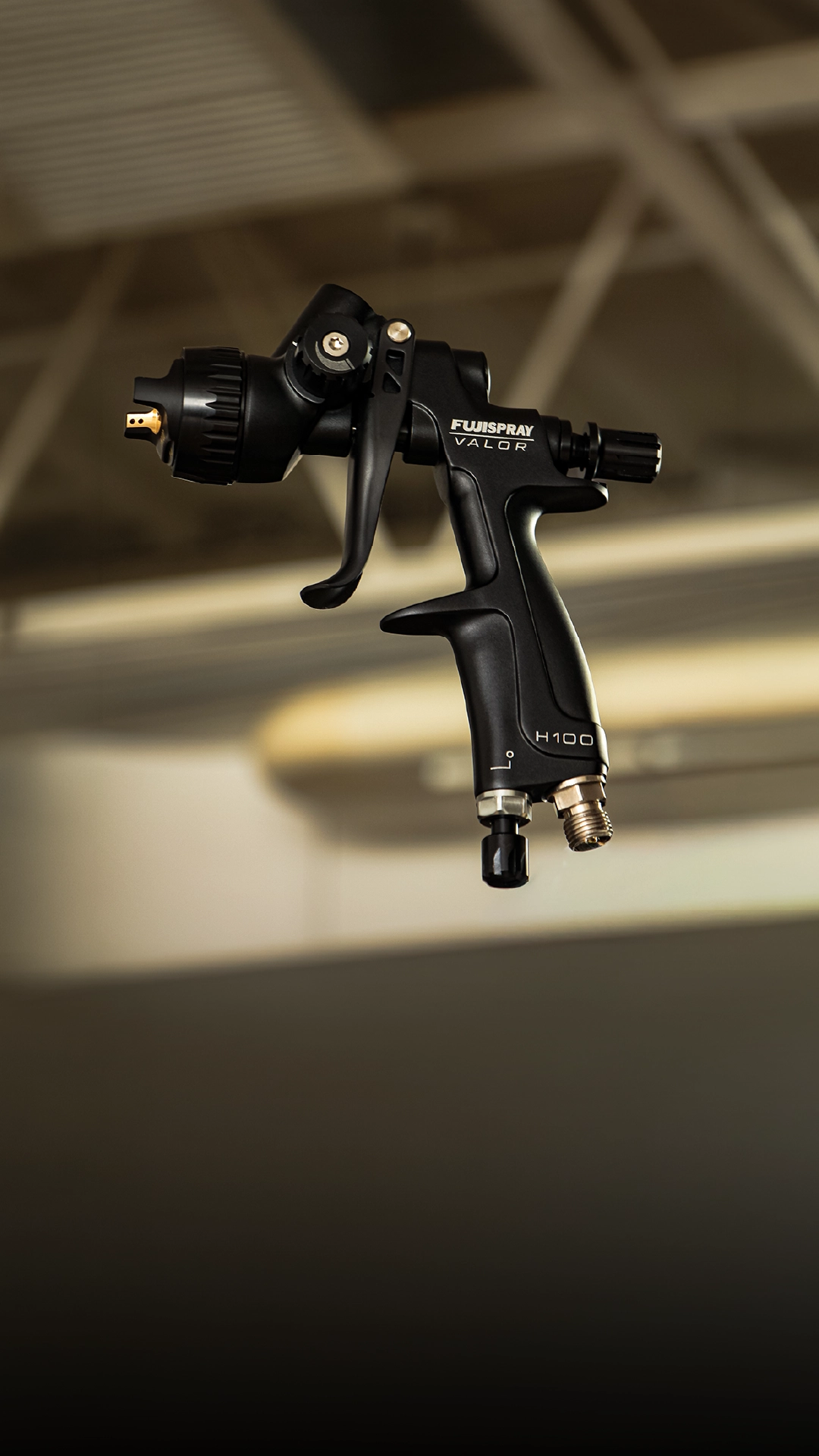 Valor H100 spray gun in the air